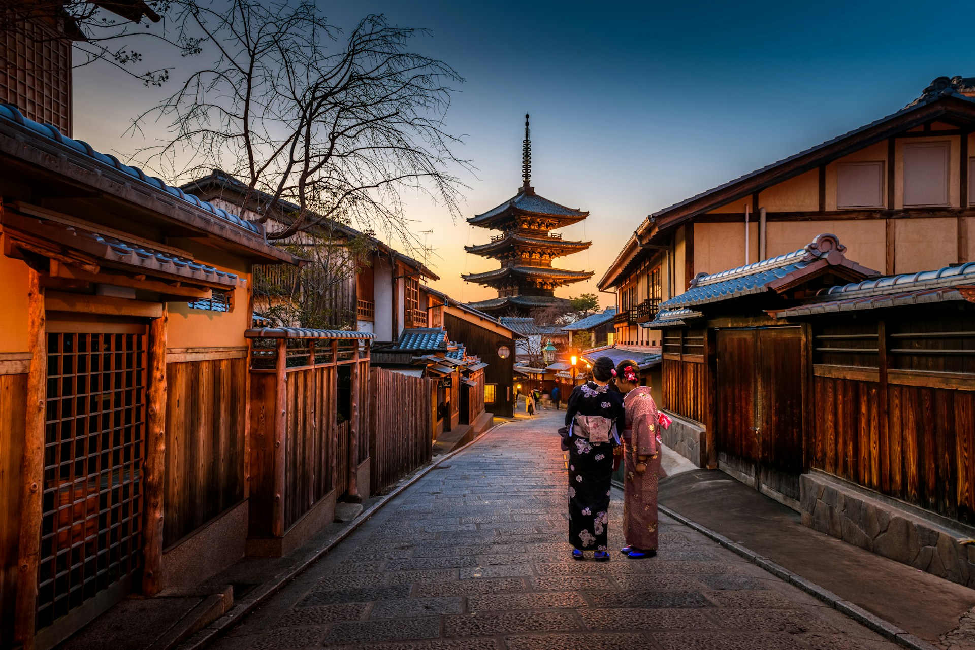 A quiet traditional street in Kyoto in the early morning, before the daytime crowds arrive